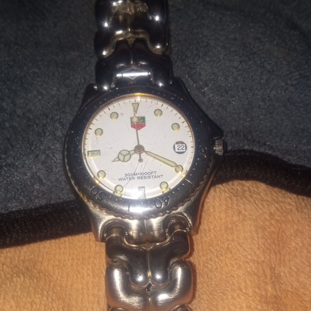 Tag Heuer Silver Watch with White Dial Swiss Made 1000 Ft Water Resistant